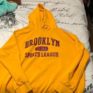Yellow hoodie with “Brooklyn” print